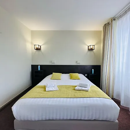 Logis - Et Restaurant Le Lion D'or Отель Грама